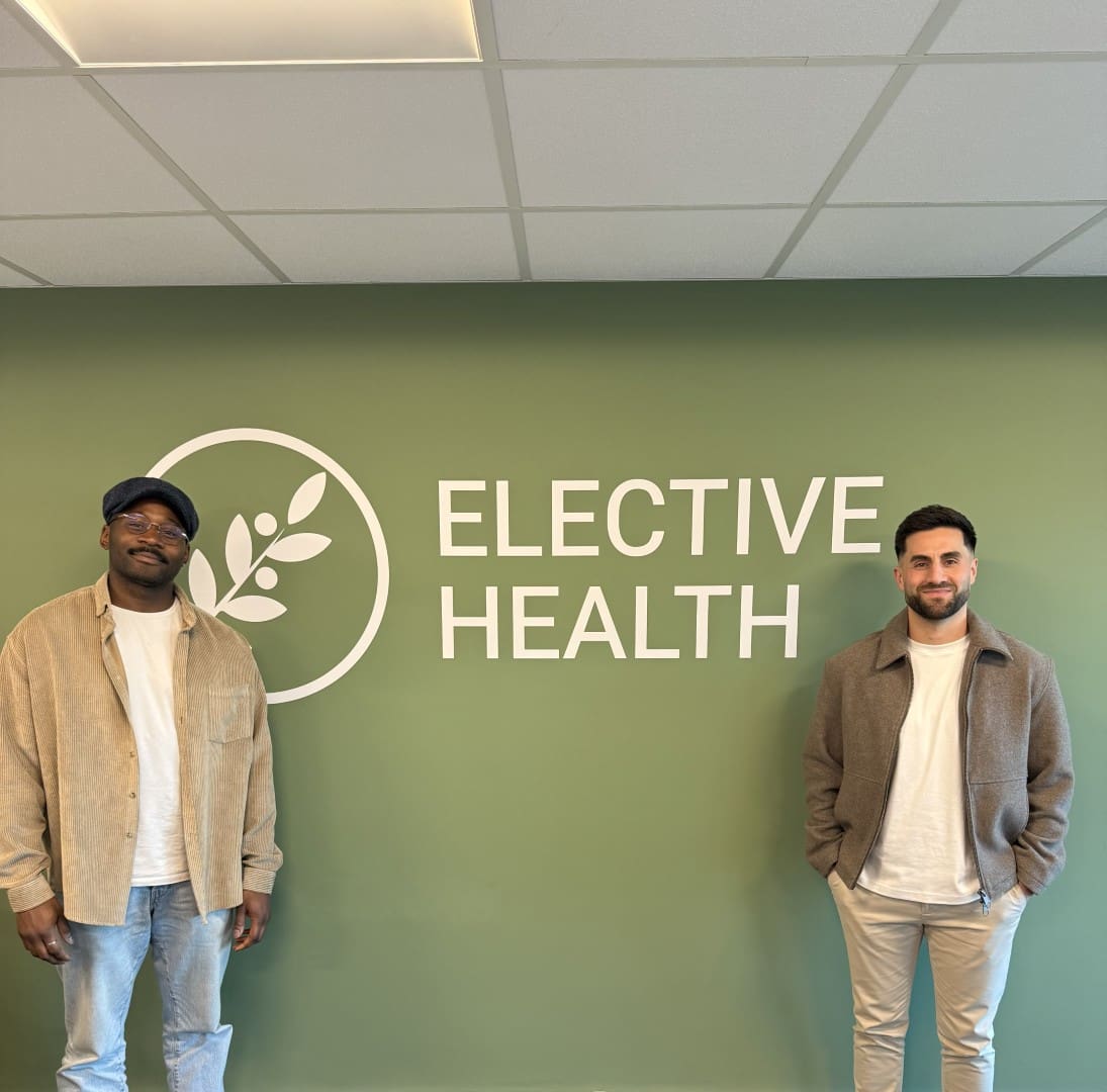 Kingsley and Louis at the Elective Health office