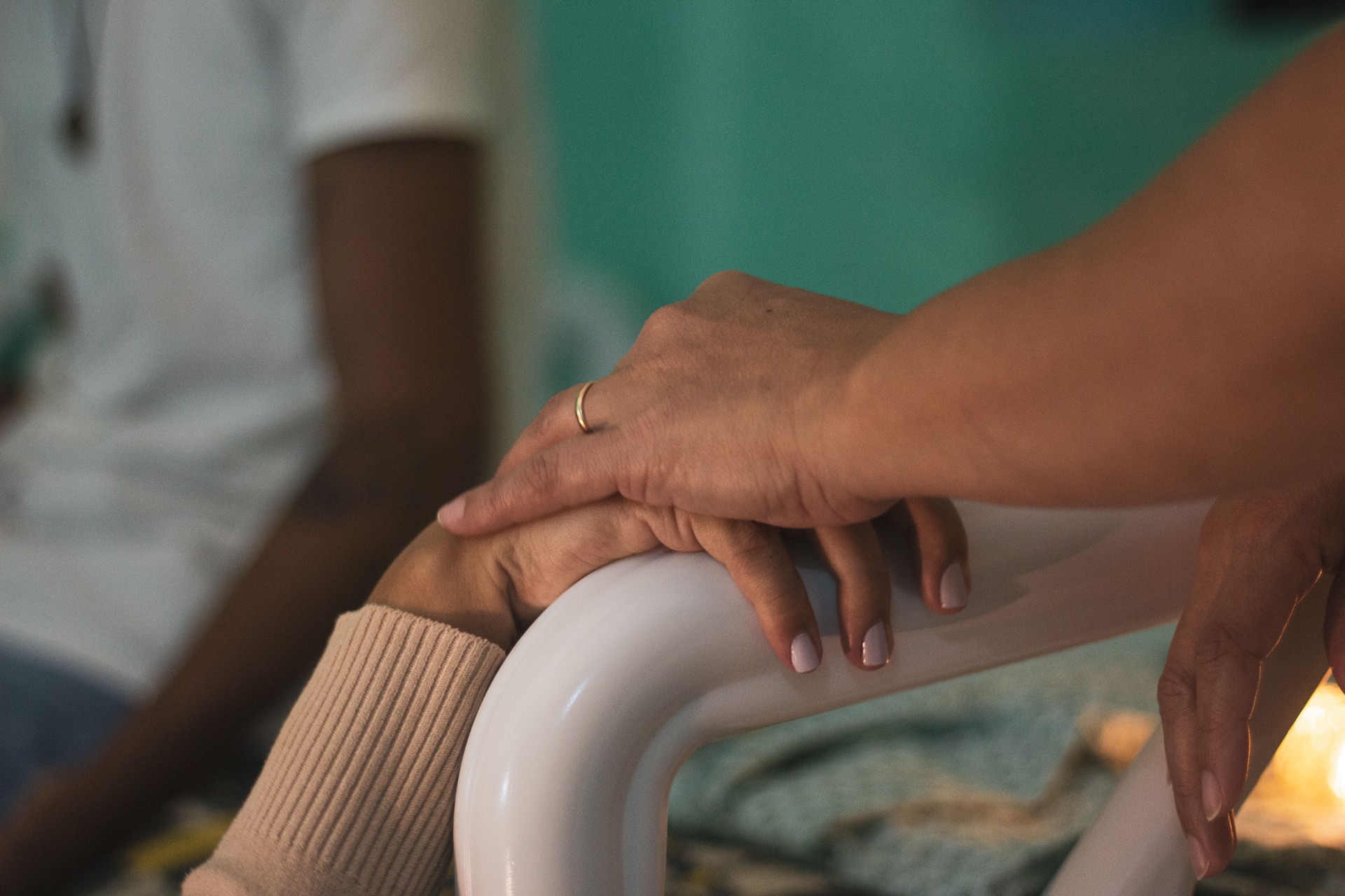 Caring hands offering comfort and support