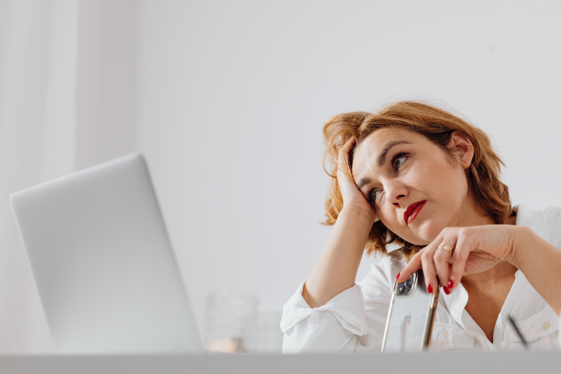 Woman thinking about her health insurance options